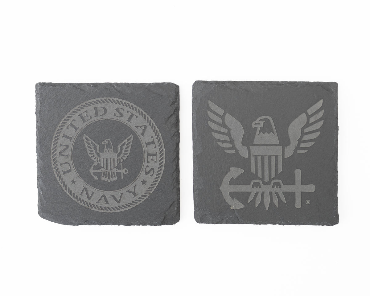 Two gray stone coasters with U.S. Navy emblem and eagle design on a white background