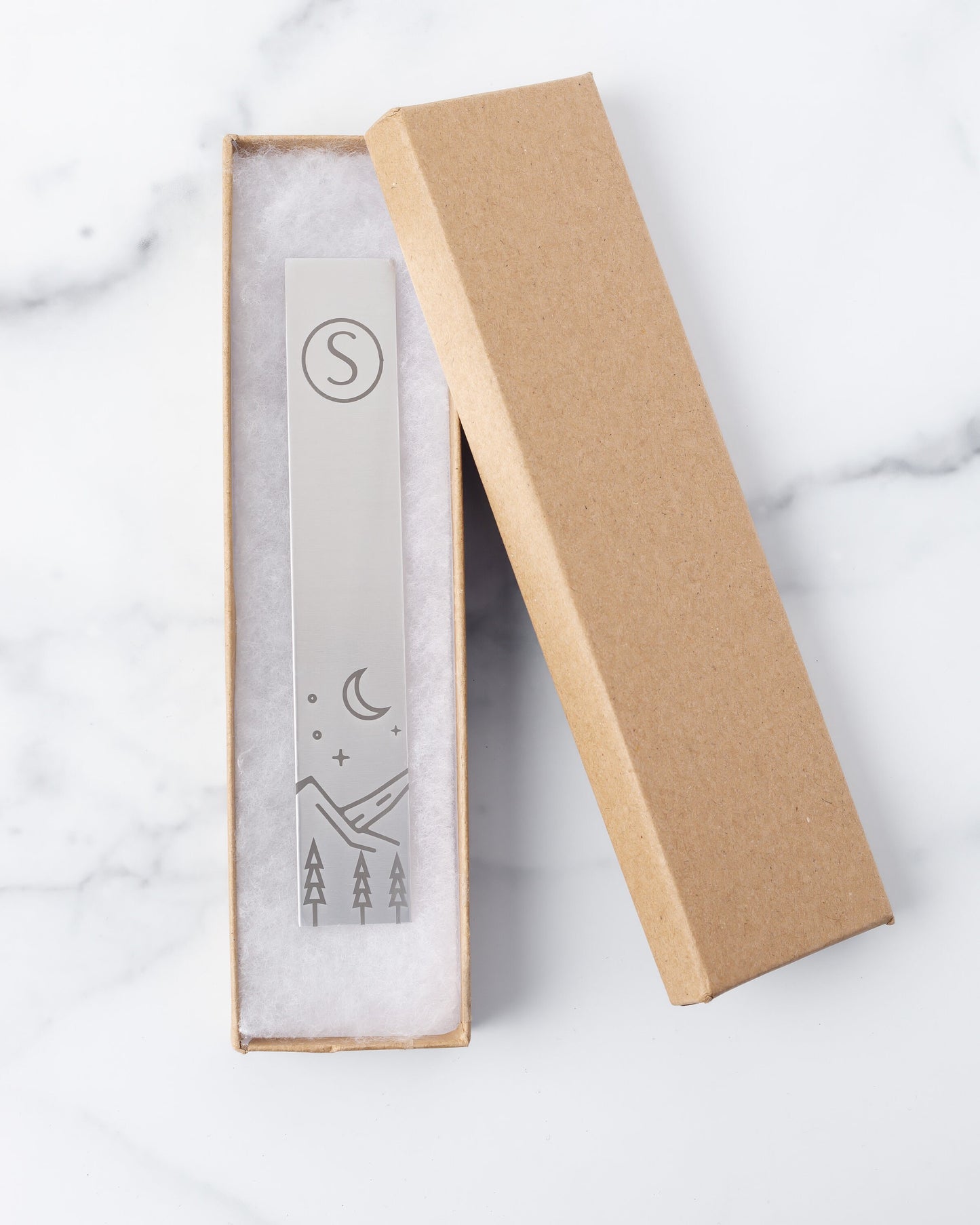 Aluminum Monogram Bookmark featuring mountains, trees, and stars design