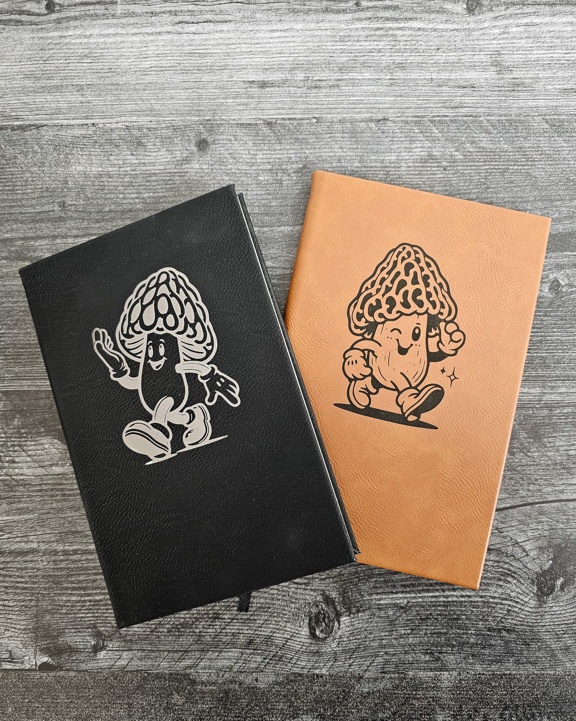 Personalized journal in black with silver and rawhide and black engraved with fun cartoon mushroom guy design.
