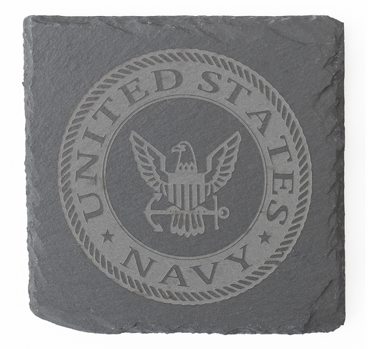 Slate coaster with engraved United States Navy logo on a white background