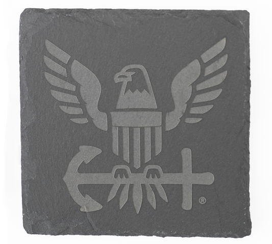 Slate coaster with engraved eagle and anchor design on a white background