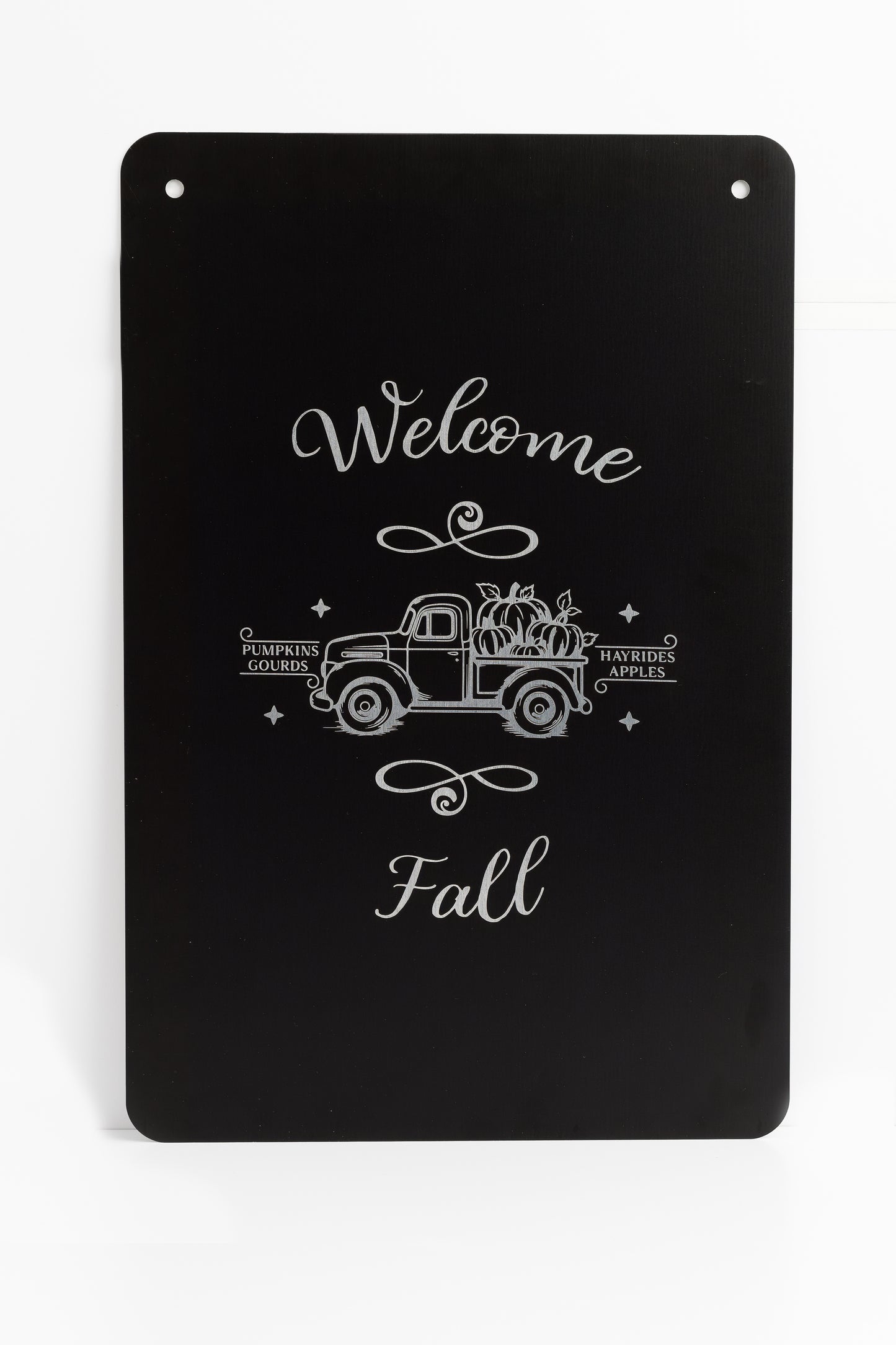 Decorative black sign with 'Welcome Fall' text and vintage truck design on a white background.