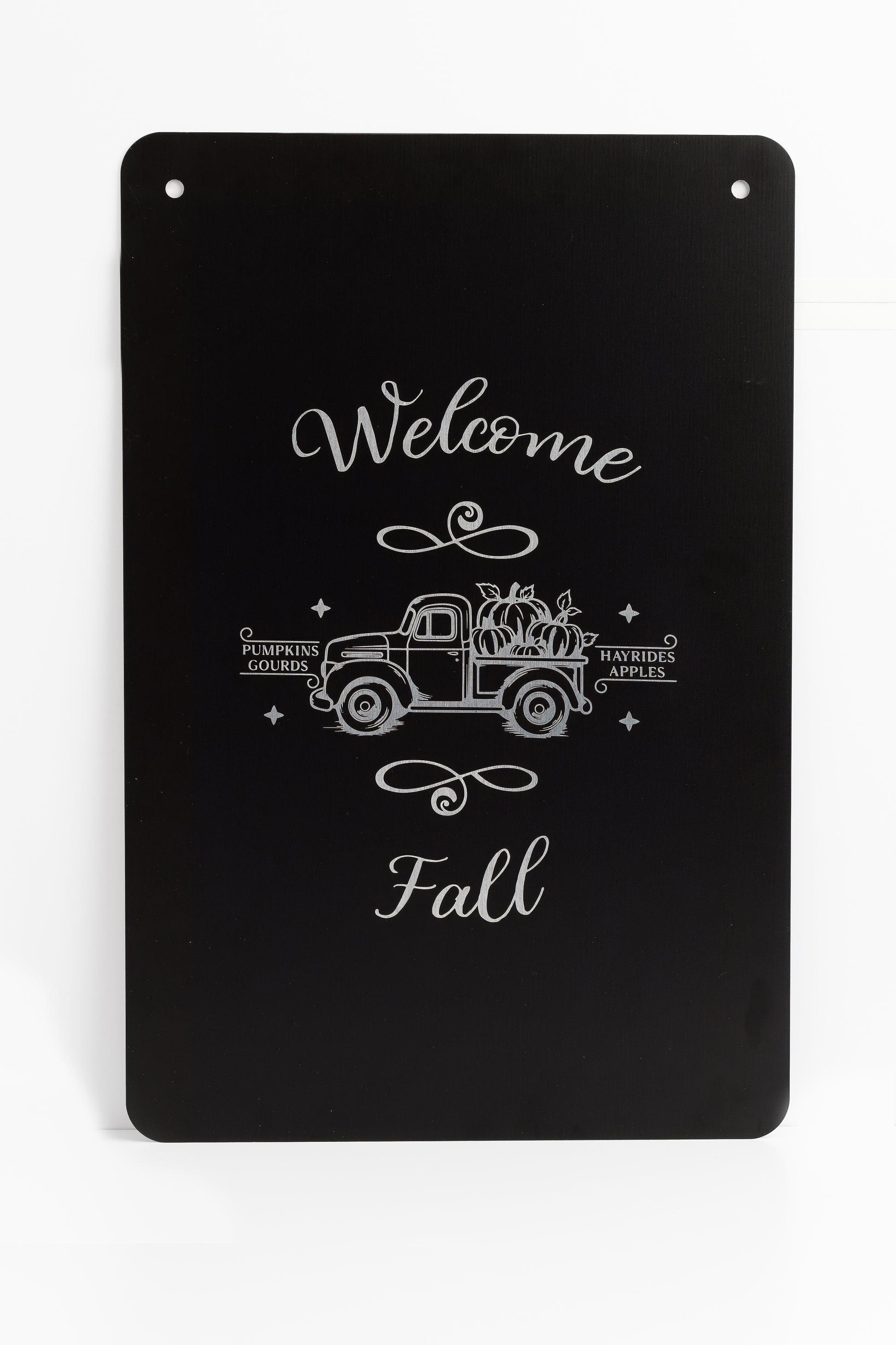 Decorative black sign with 'Welcome Fall' text and vintage truck design on a white background.