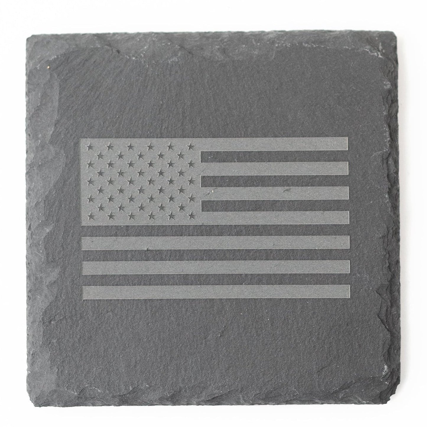 Slate coaster with American flag engraving on a white background