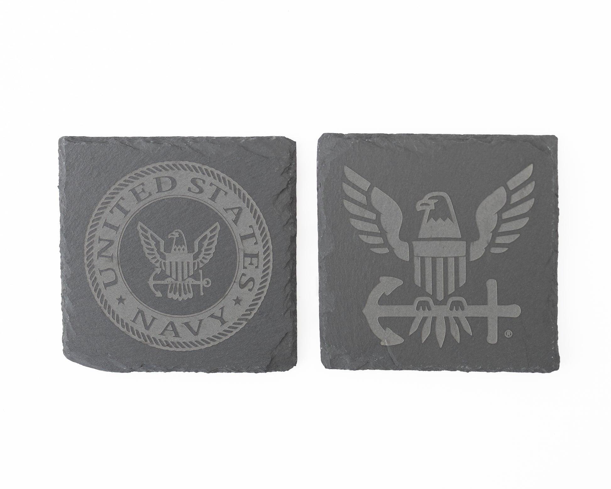 Two gray stone coasters with U.S. Navy emblem and eagle design on a white background