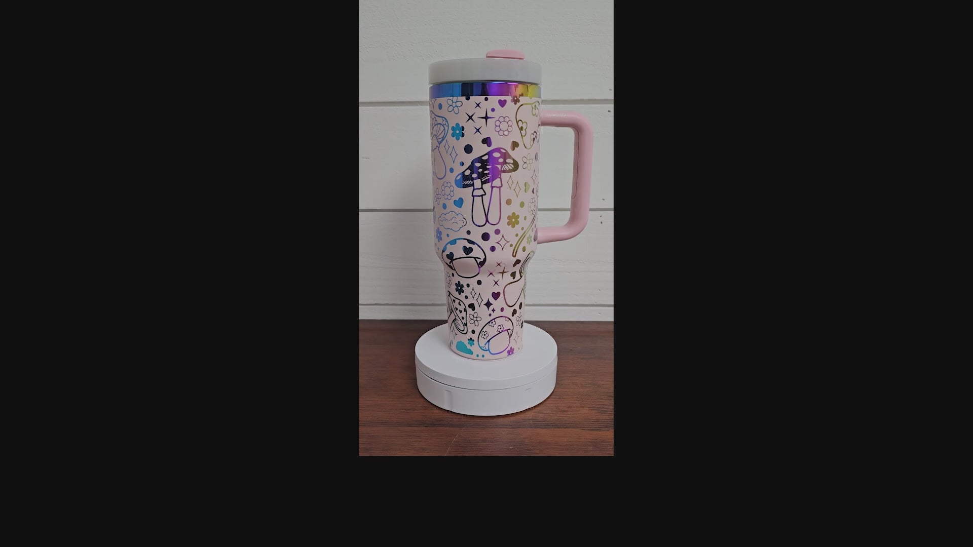 40oz tumbler in pink and rainbow with magic mushroom wrap design. 